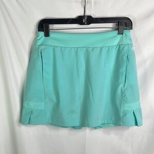 Nike aqua, athletic tennis skirt with trunks and front pockets